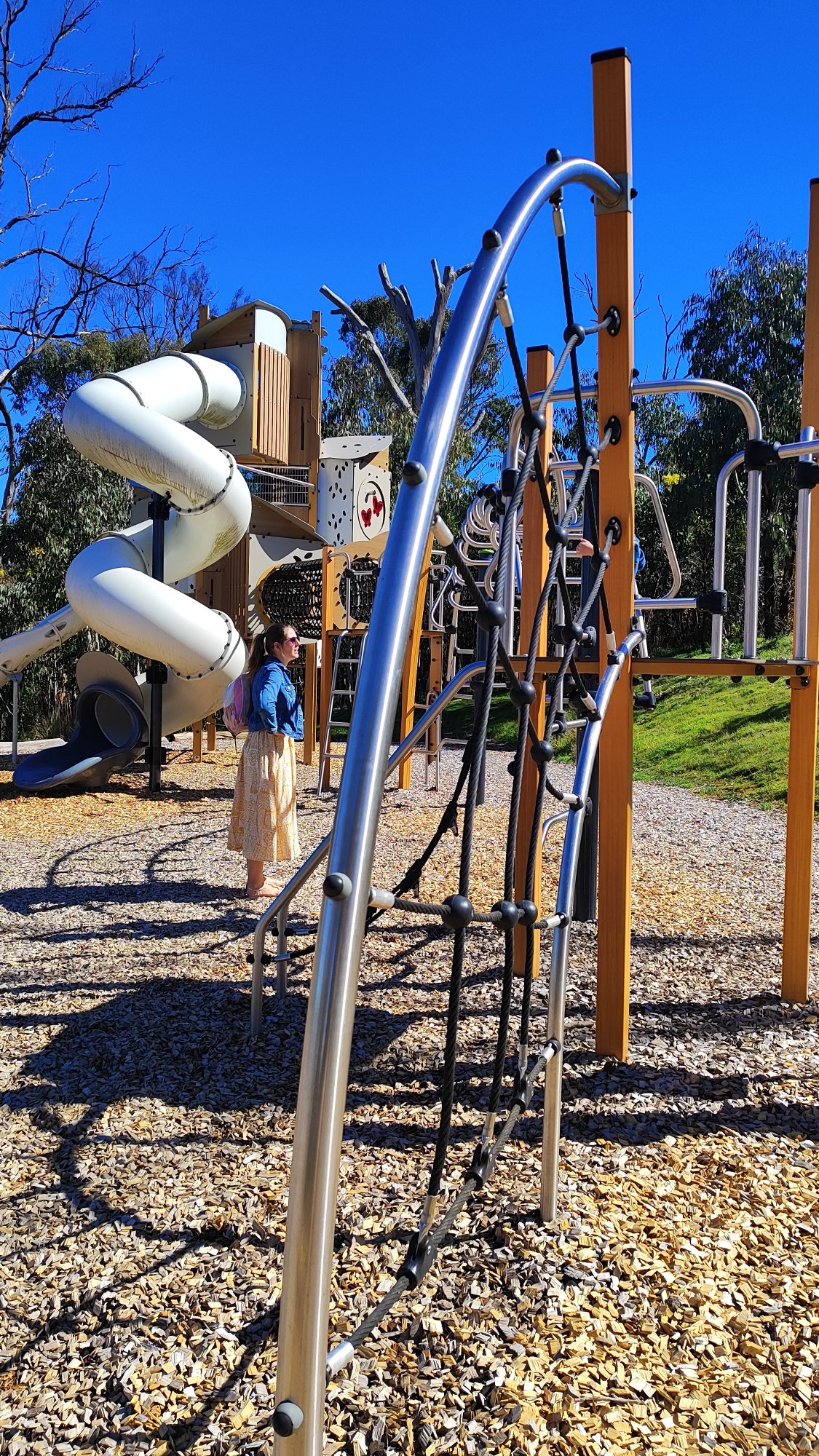 Nature Playground with Tall Tube Slide photo