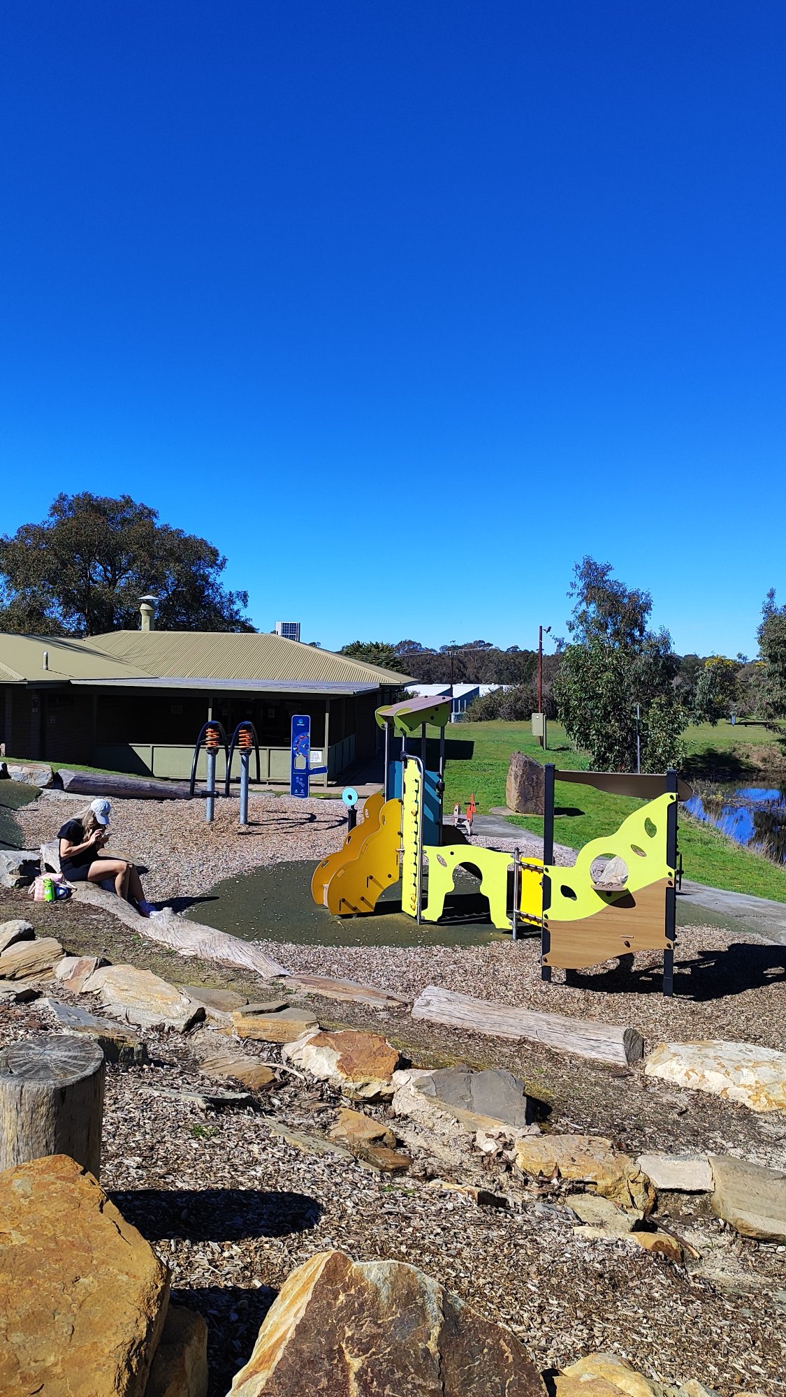 Nature Playground with Tall Tube Slide photo