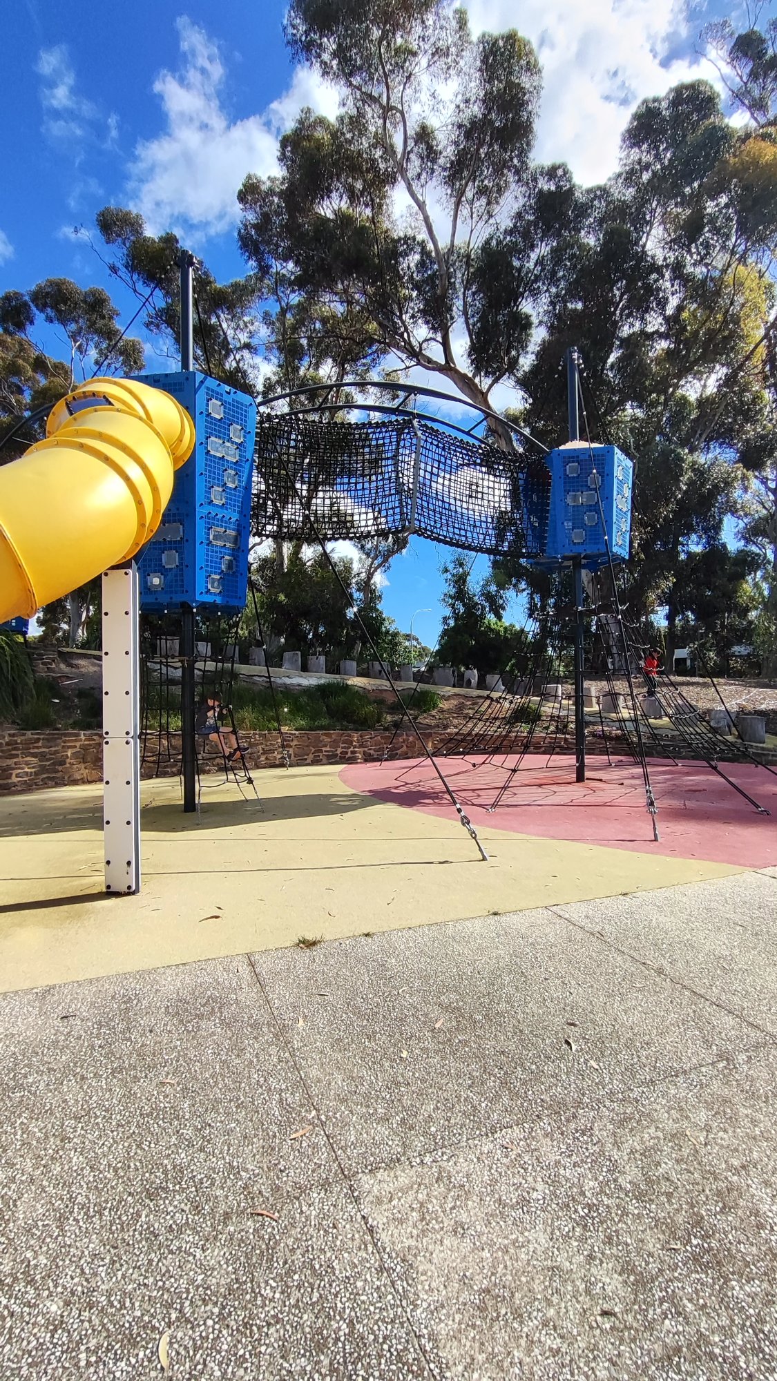 Adventure Playground with Climbing Towers and Slide photo